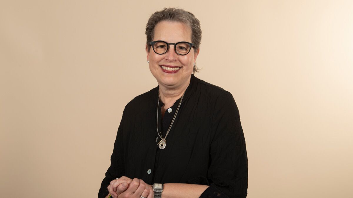 Woman smiling.